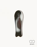 Guasha facial de acero